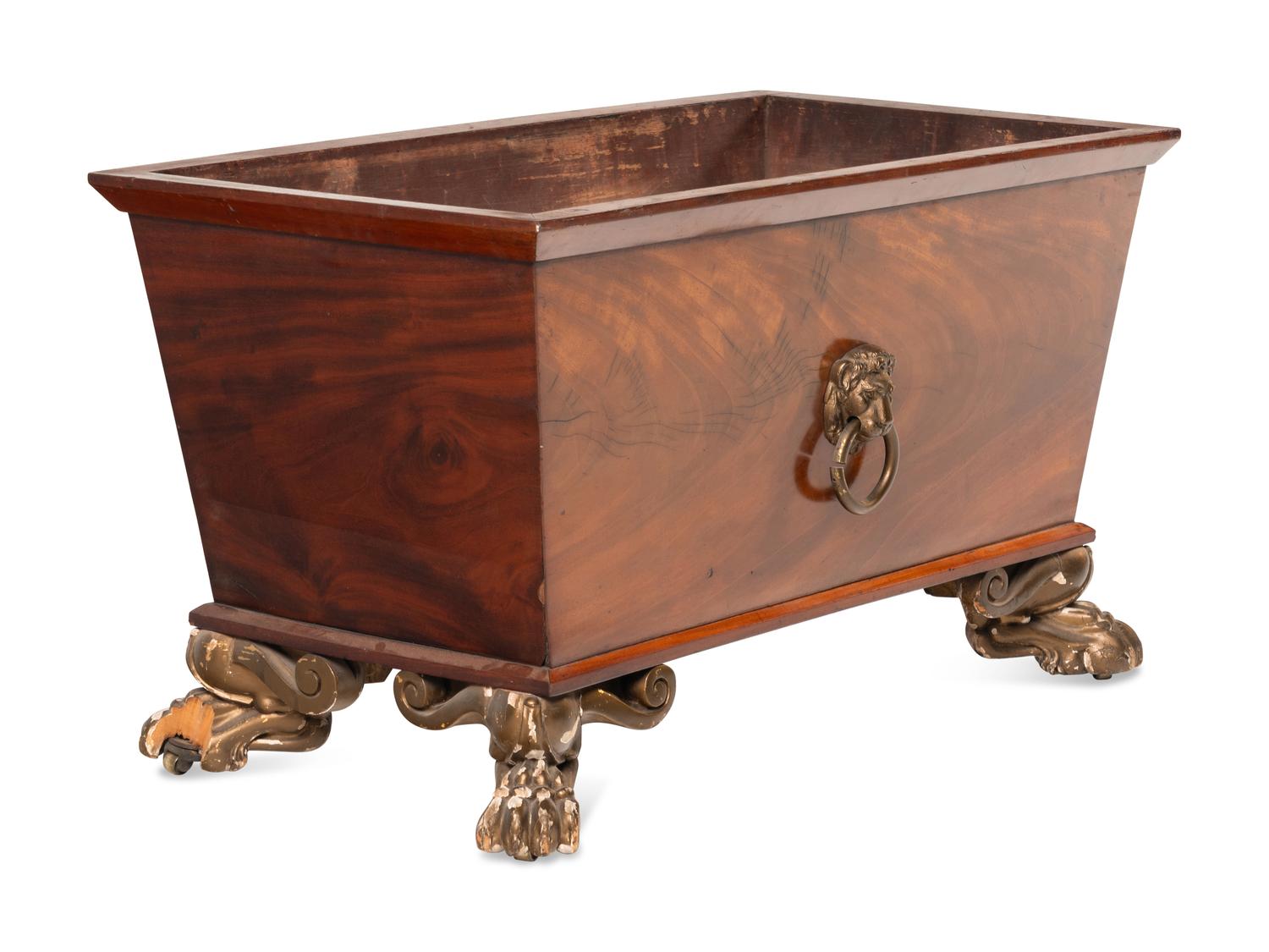 A George III Style Parcel Gilt Mahogany Cellarette