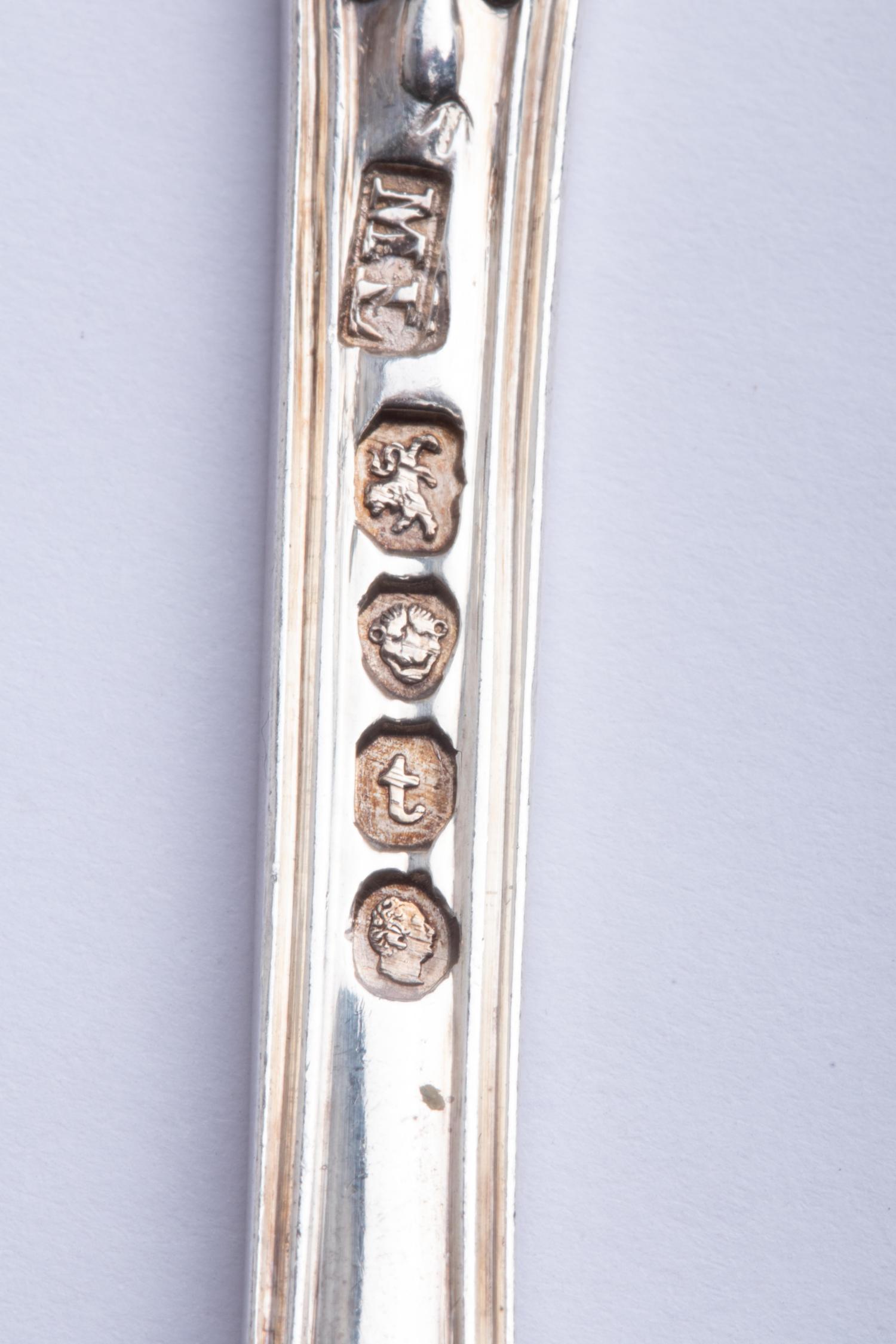 A Group of Twelve English Silver Soup Spoons