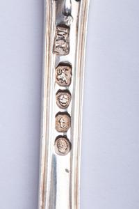 A Group of Twelve English Silver Soup Spoons