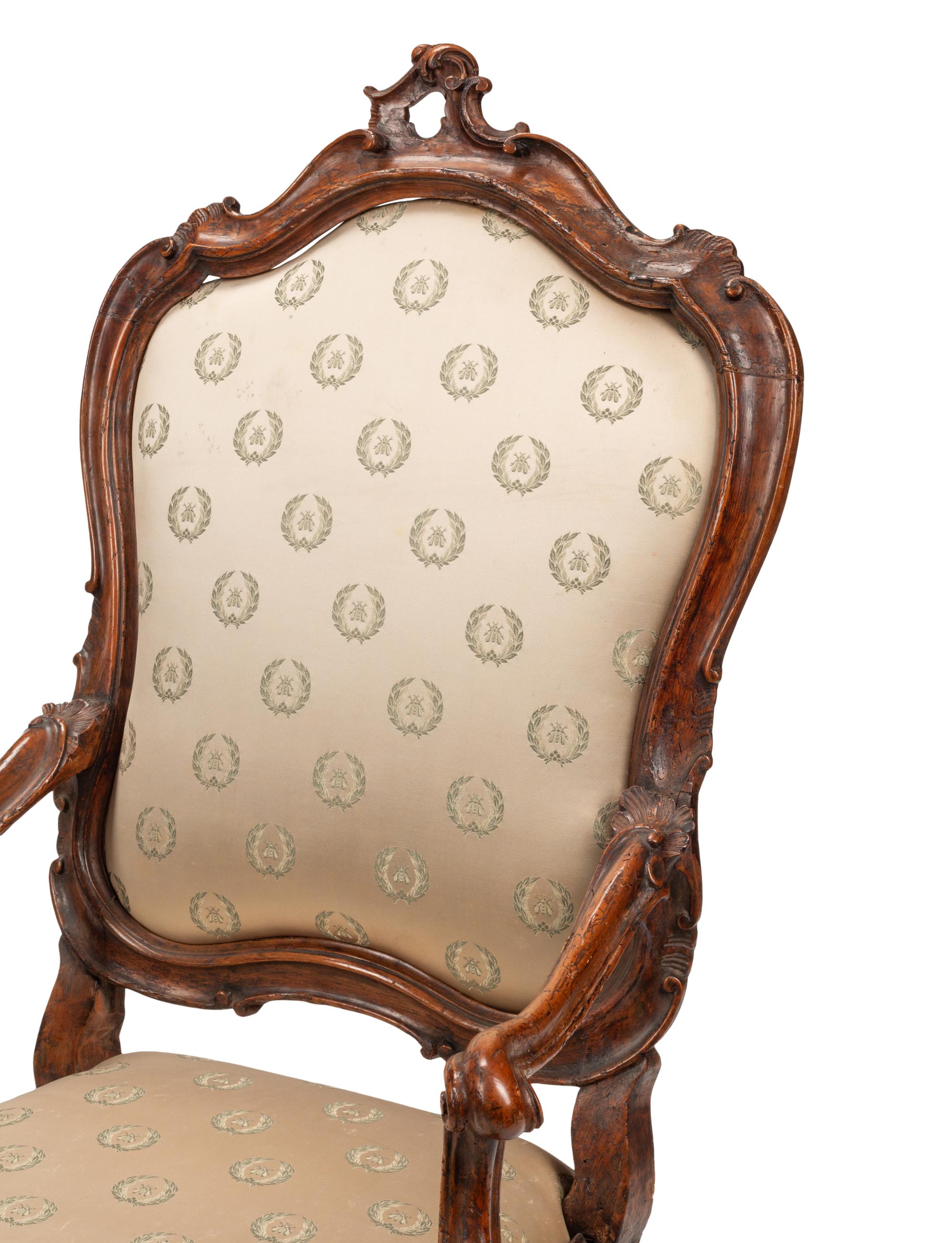 A Pair of Venetian Carved Walnut Armchairs
