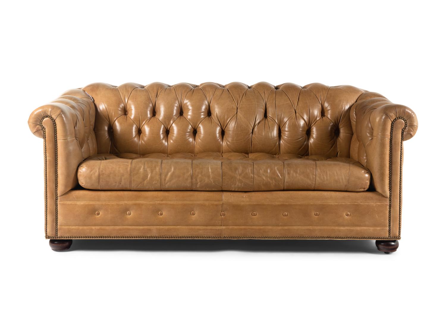 A Leather Upholstered Chesterfield Convertible Sofa