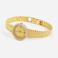A Ladies 14K Yellow Gold and Diamond Watch