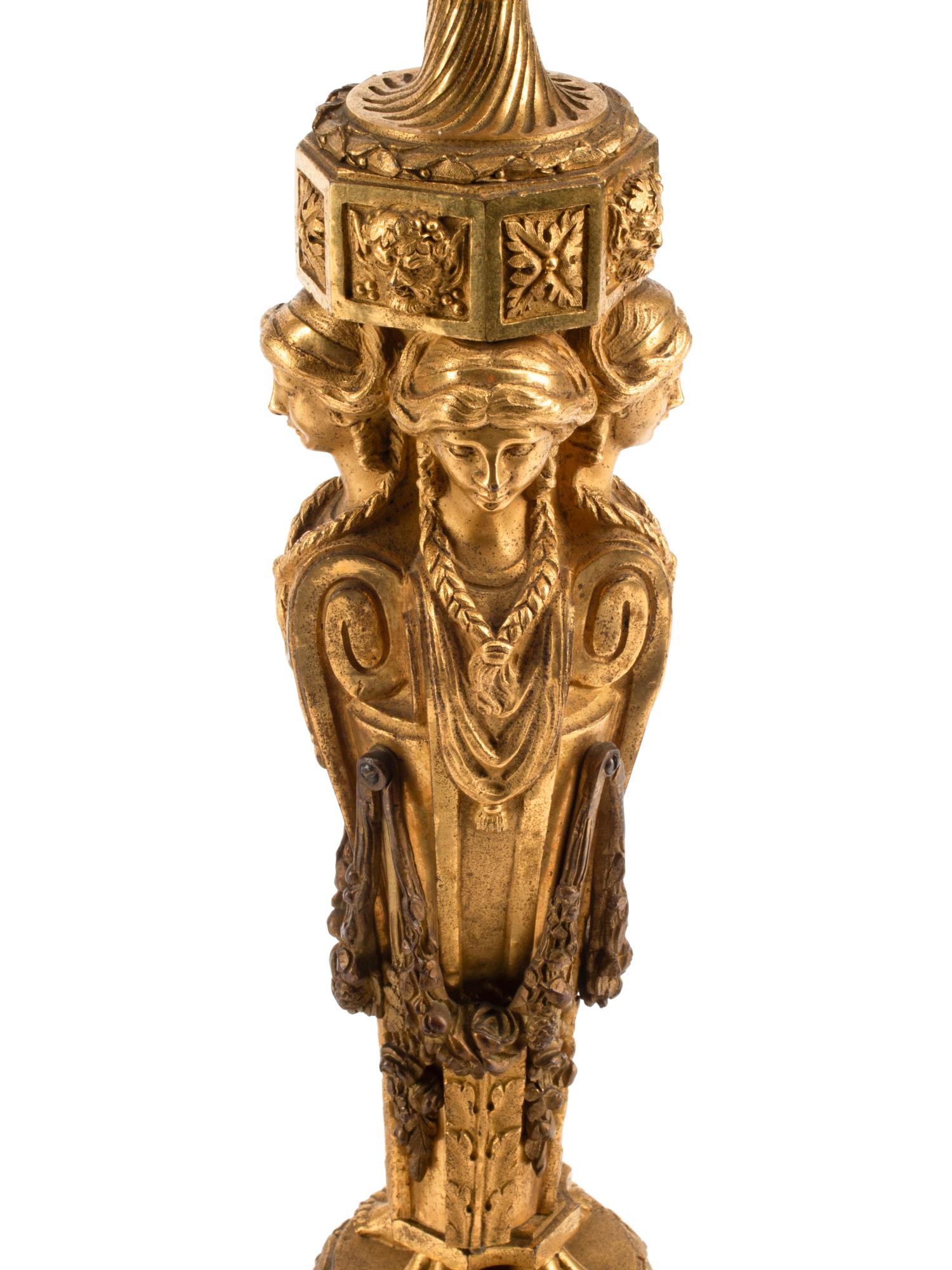 A Pair of Charles X Gilt Bronze Candlesticks