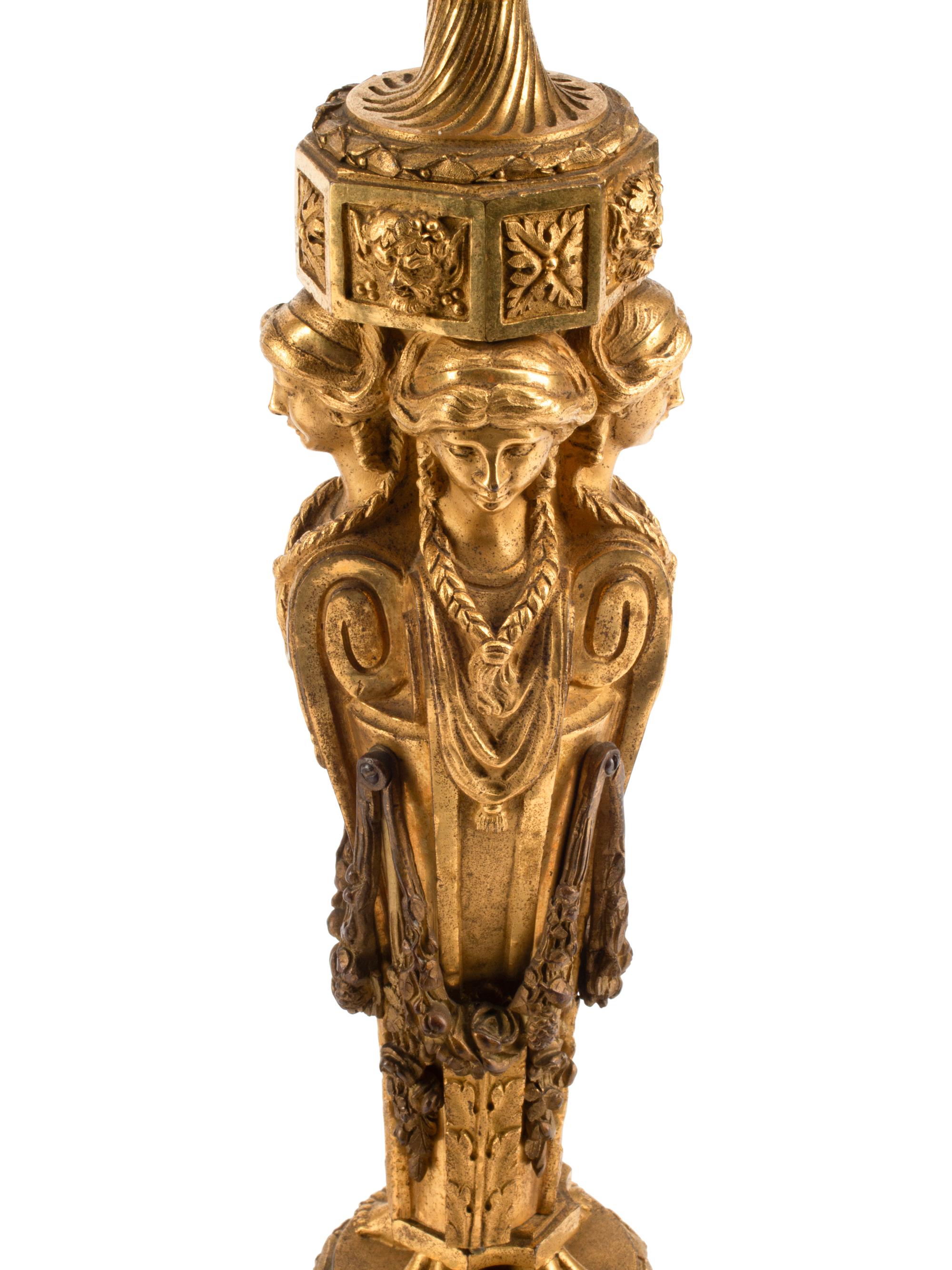 A Pair of Charles X Gilt Bronze Candlesticks