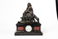 A French Bronze Mantel Clock