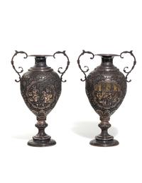A Pair of Persian Silvered Copper Vases