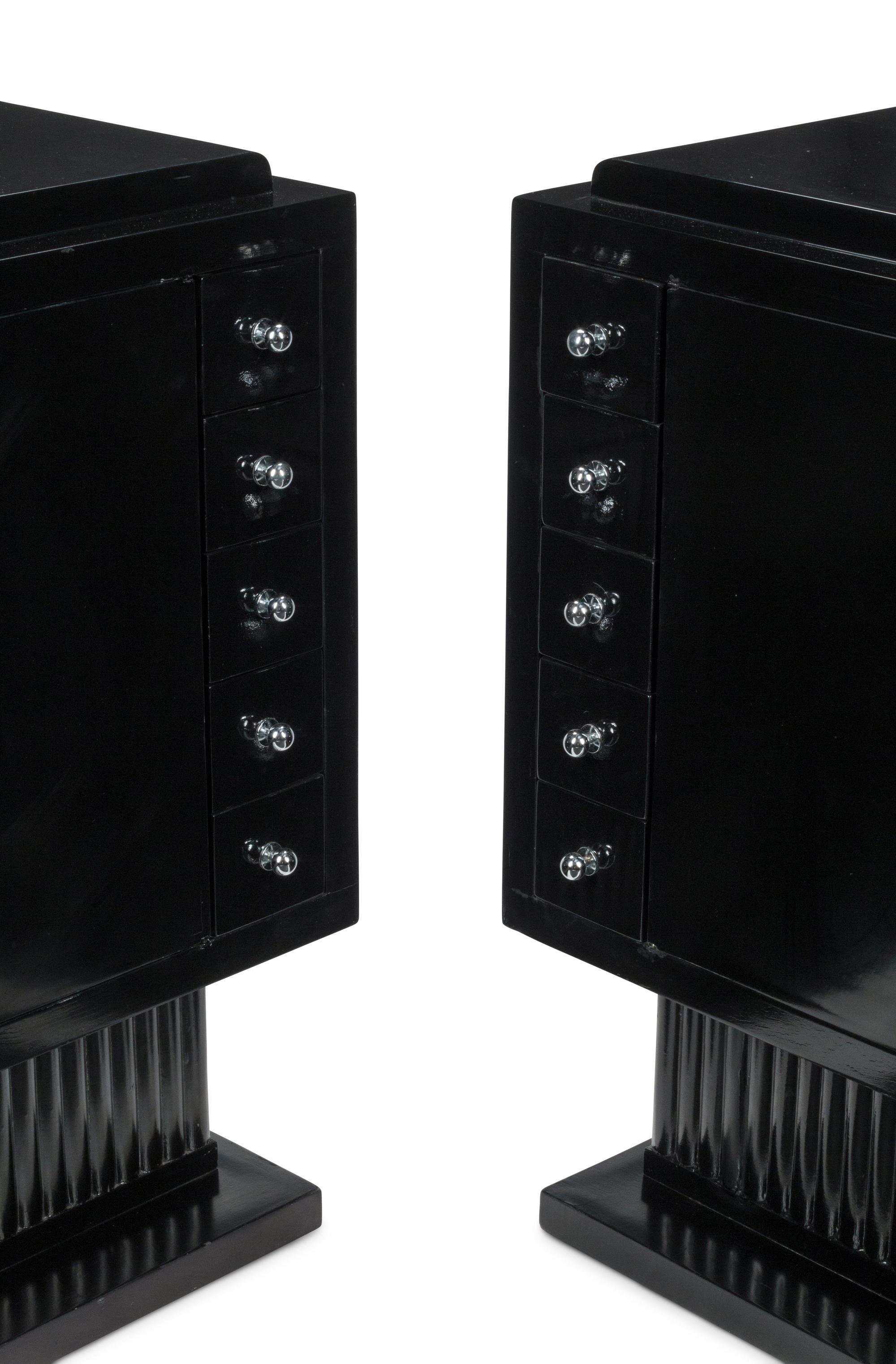 A Pair of Art Deco Style Ebonized Cabinets