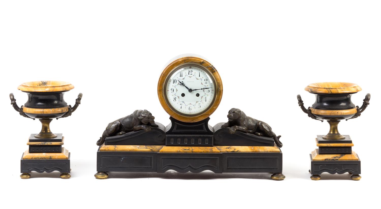 A French Bronze Mounted Marble Clock Garniture Height of clock 14 inches. — RETAILED BY TIFFANY & CO.