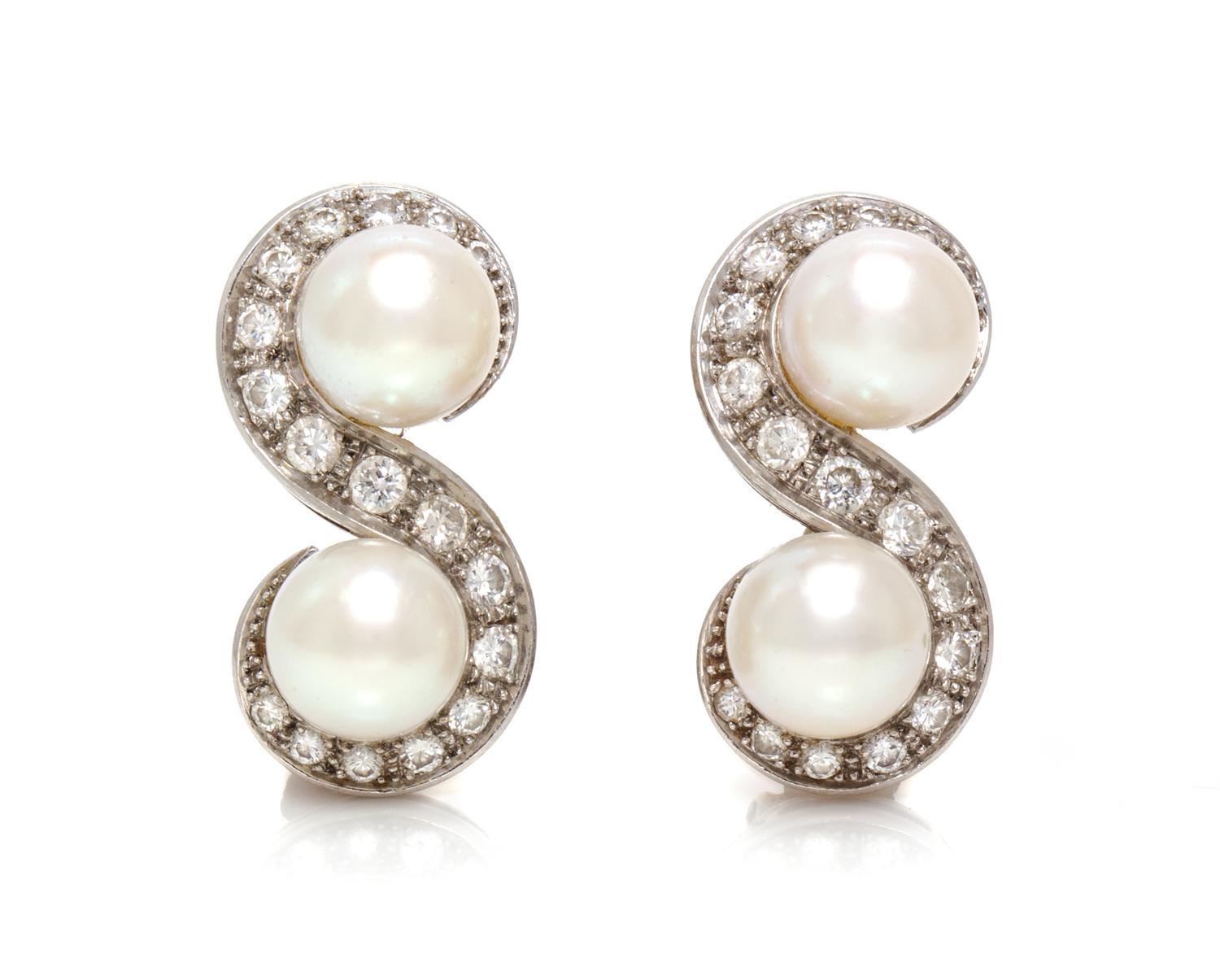A Pair of Platinum, White Gold, Cultured Pearl and Diamond Earclips, French, 8.95 dwts.
