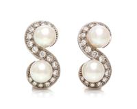 A Pair of Platinum, White Gold, Cultured Pearl and Diamond Earclips, French, 8.95 dwts.