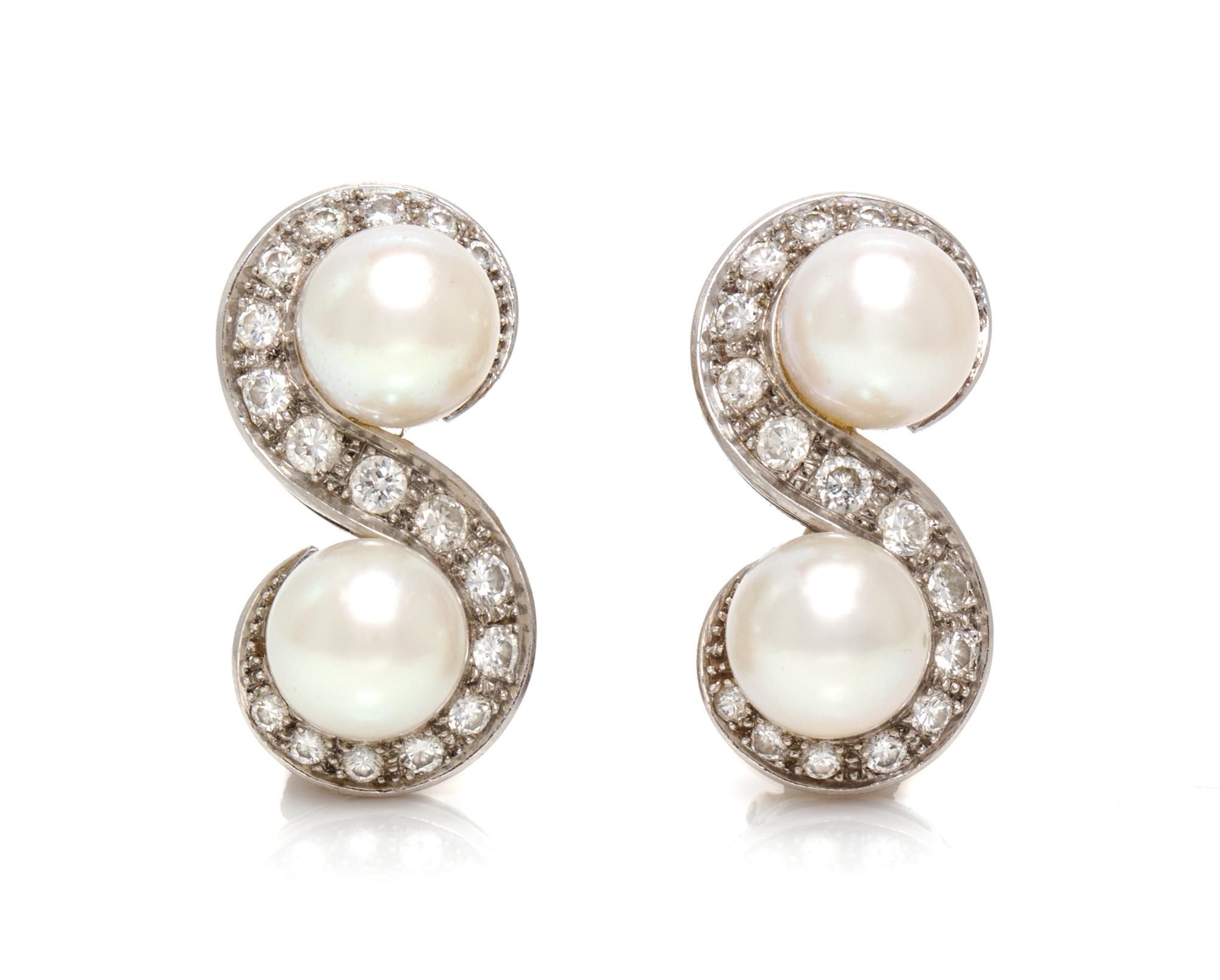 A Pair of Platinum, White Gold, Cultured Pearl and Diamond Earclips, French, 8.95 dwts.