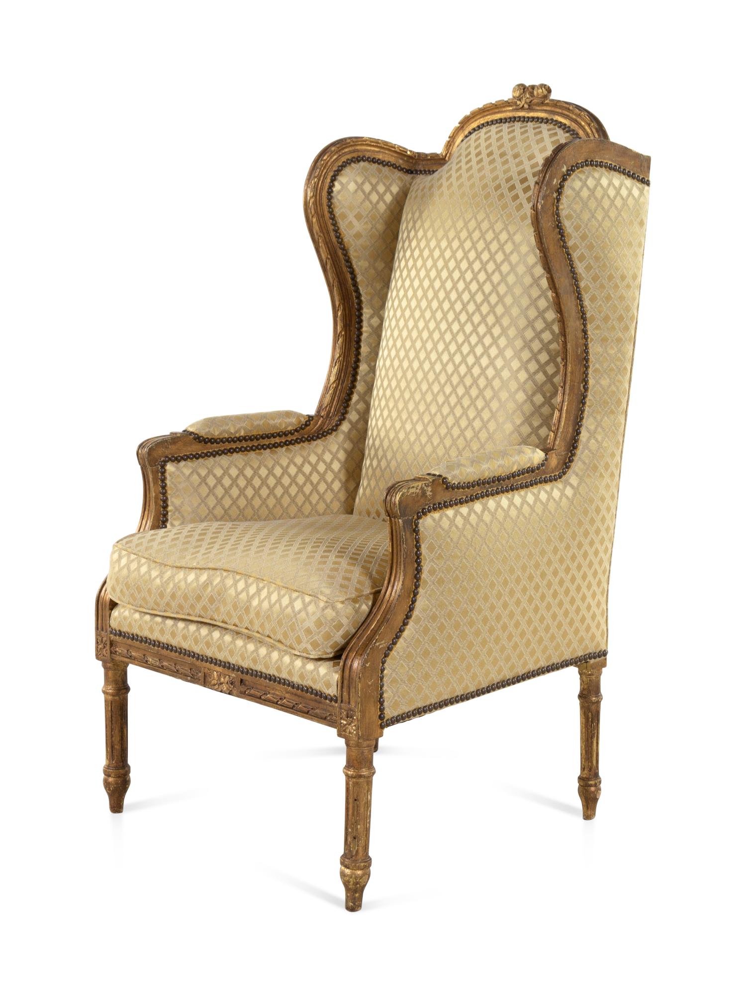 A Louis XVI Style Giltwood Bergère à Oreilles