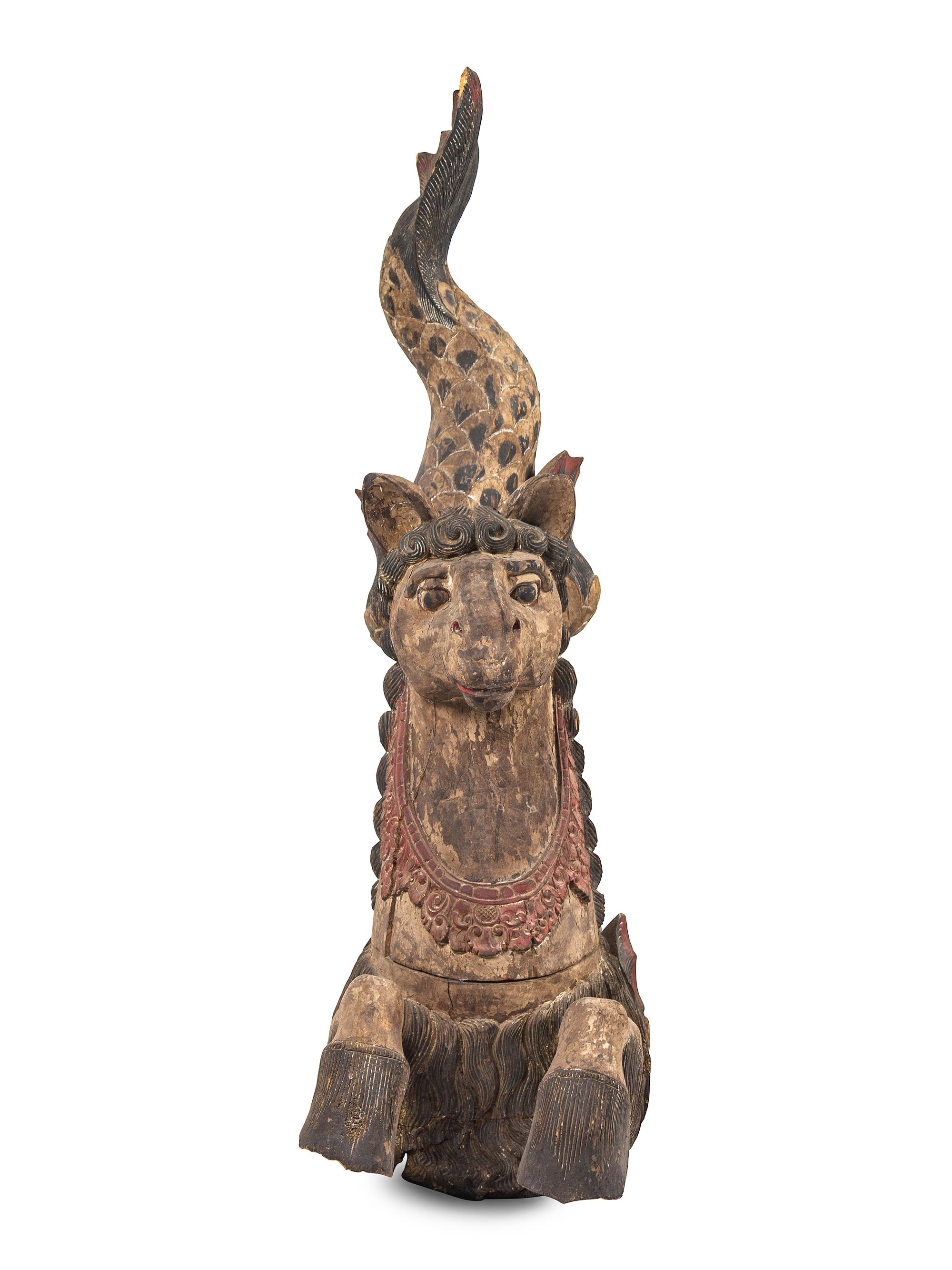 A Pair of Large Balinese Carved and Polychrome Decorated Models of Hippocampi