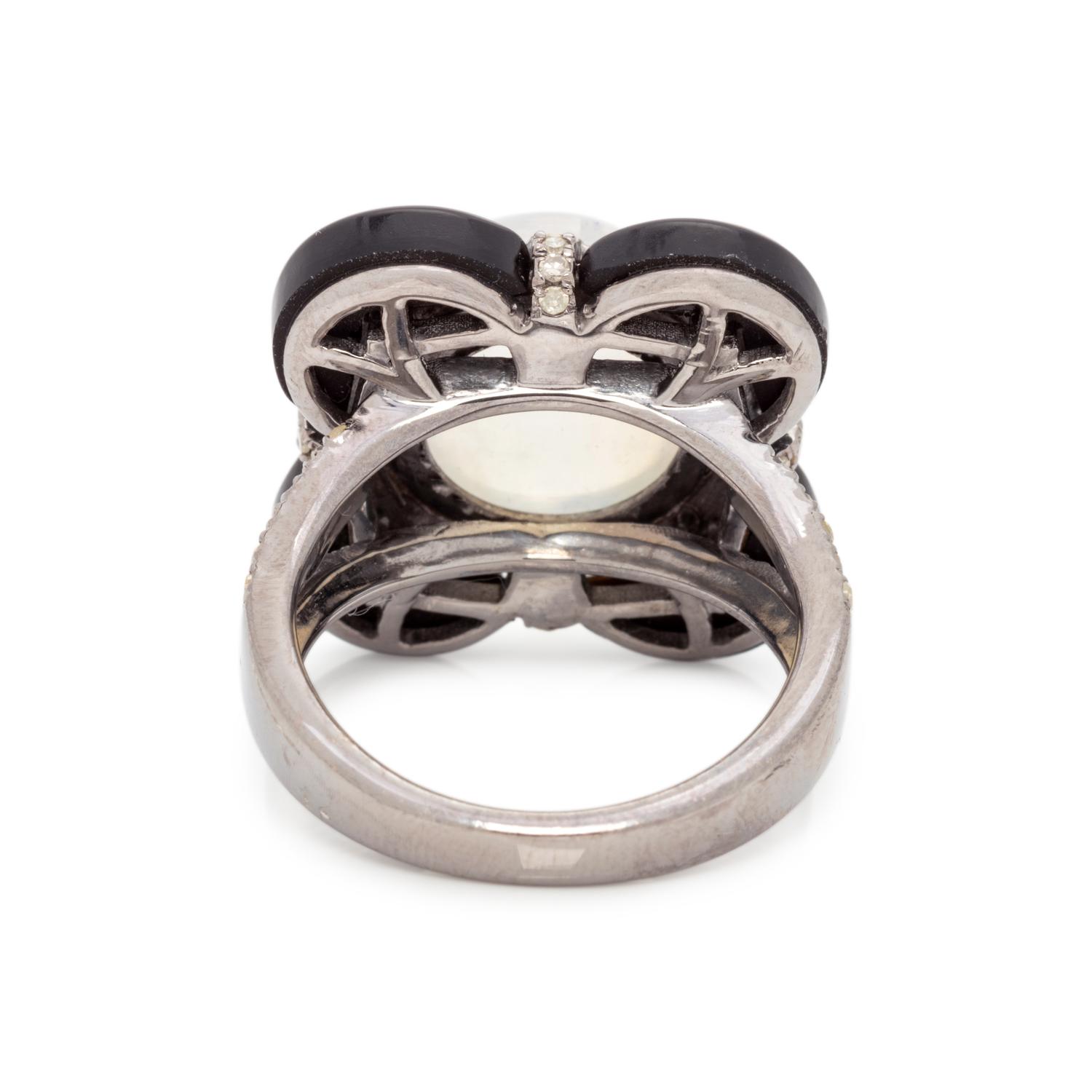 MOONSTONE, DIAMOND AND ONYX RING