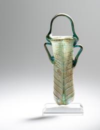 A Roman Green Glass Double Unguentarium