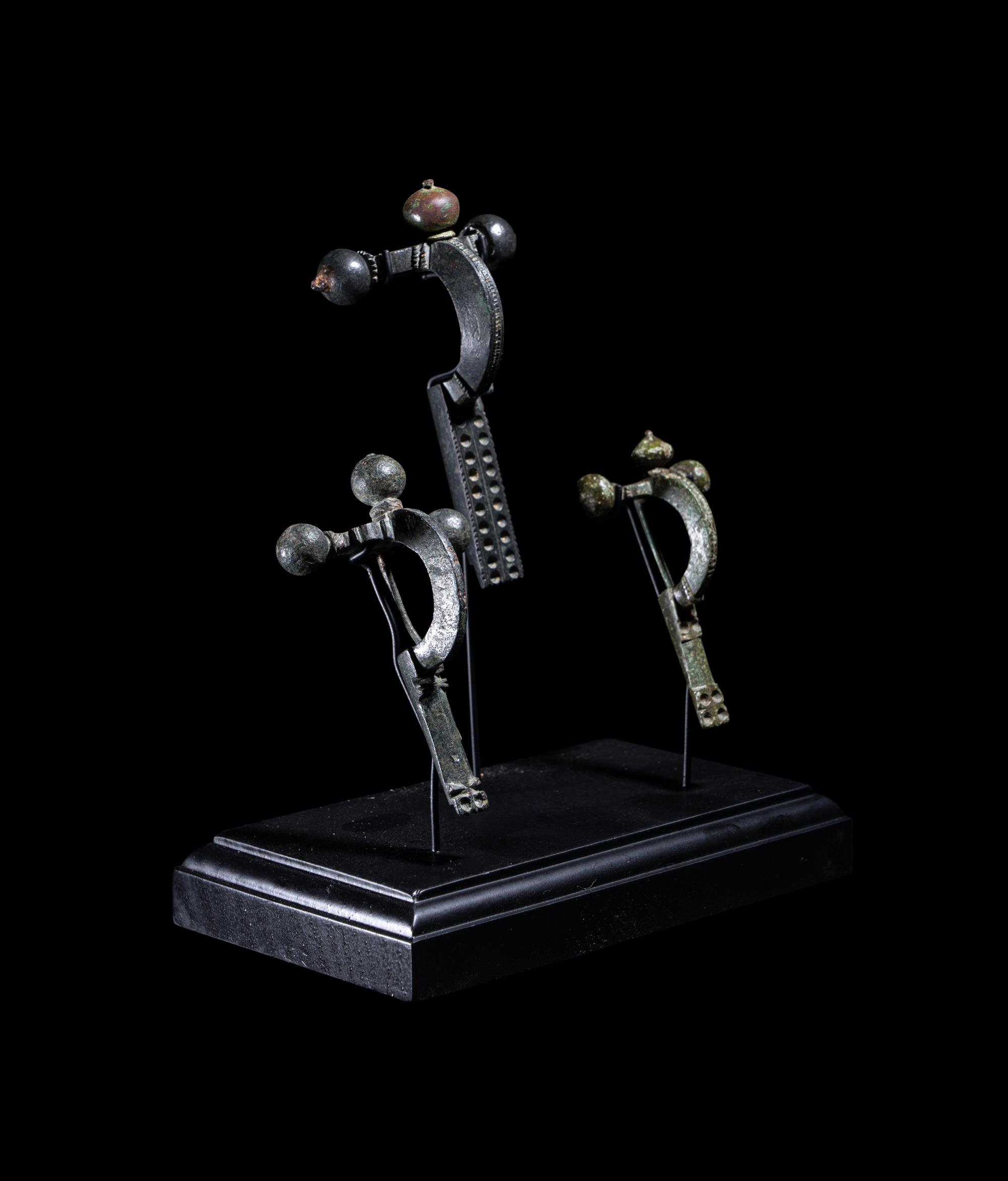 Three Roman Bronze Crossbow Fibulae