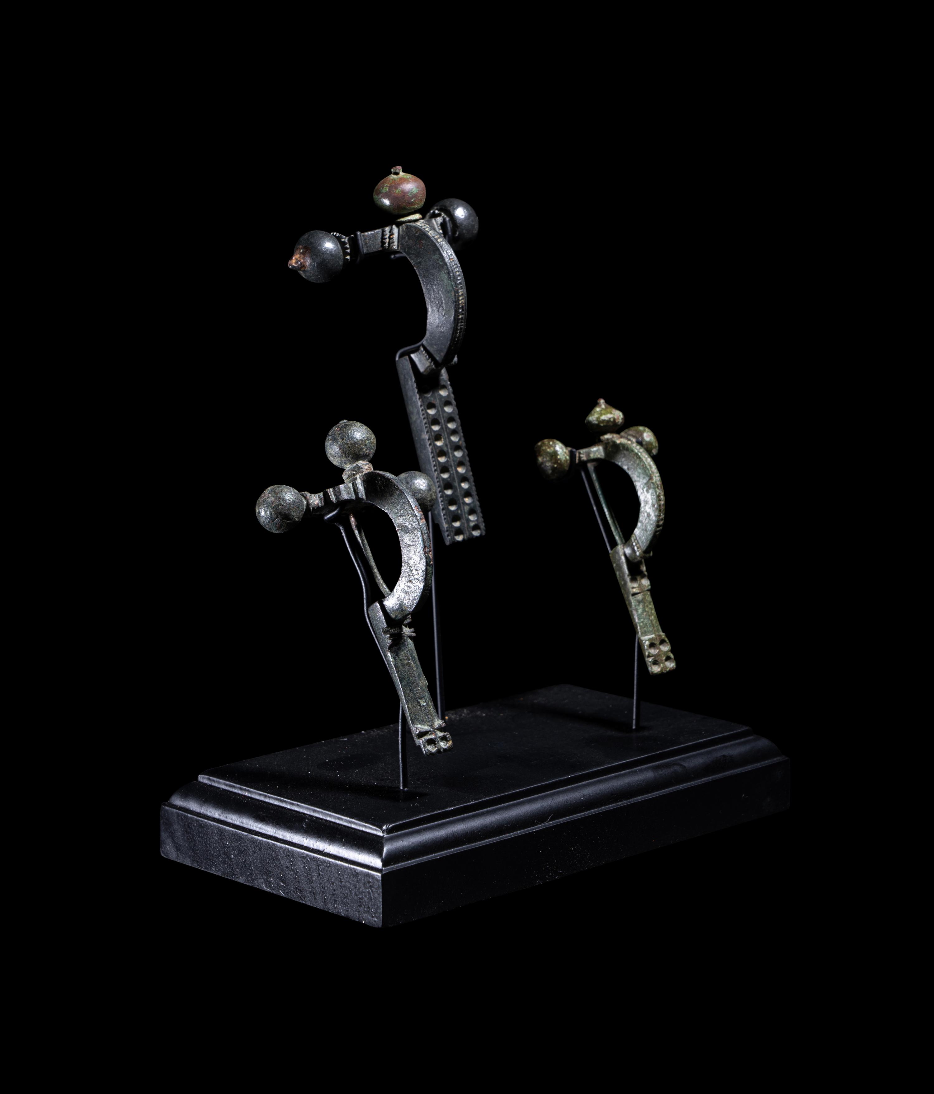 Three Roman Bronze Crossbow Fibulae