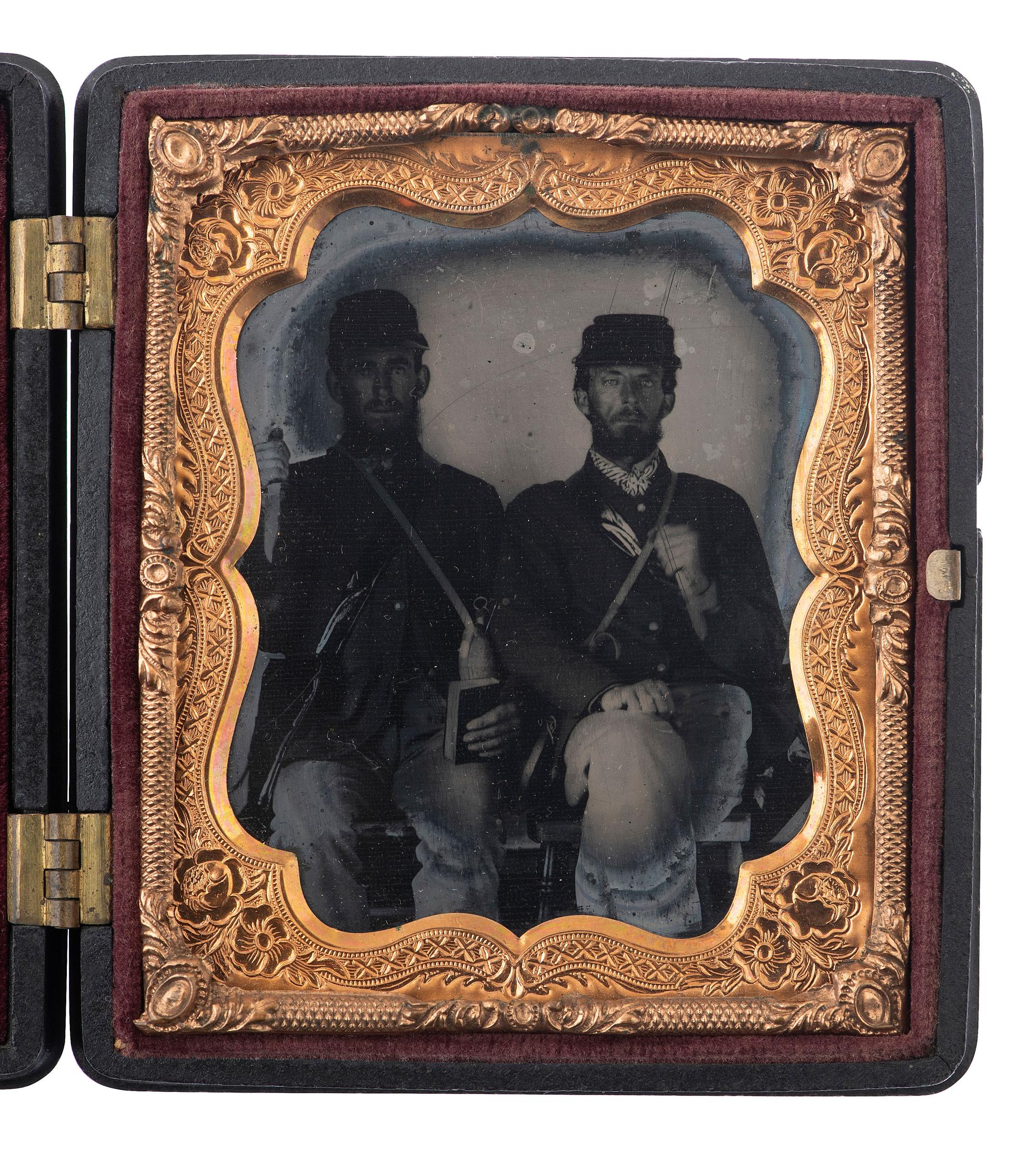 [CIVIL WAR]. Sixth plate ambrotype of Union privates displaying their knives.