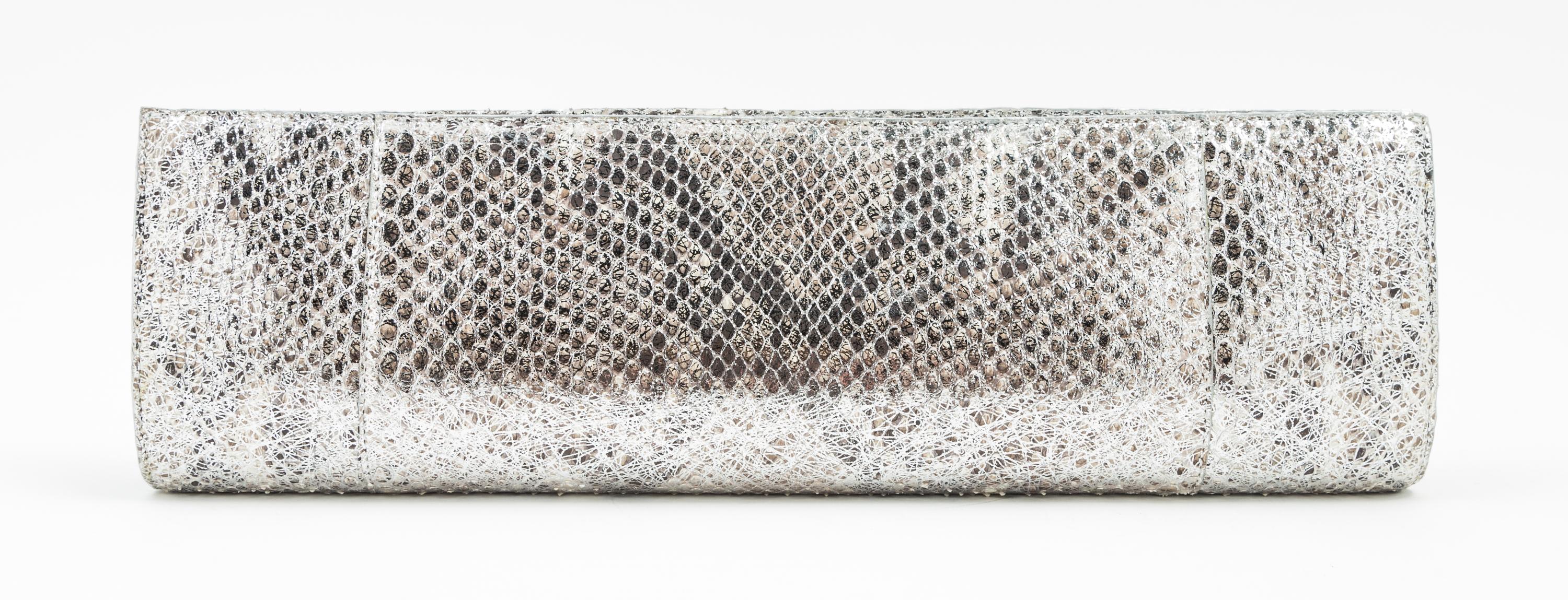 A Nancy Gonzalez Silver Python Long Clutch, 13.5" x 4" x 1.5".