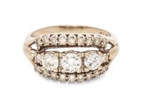 A 14 Karat White Gold and Diamond Ring,