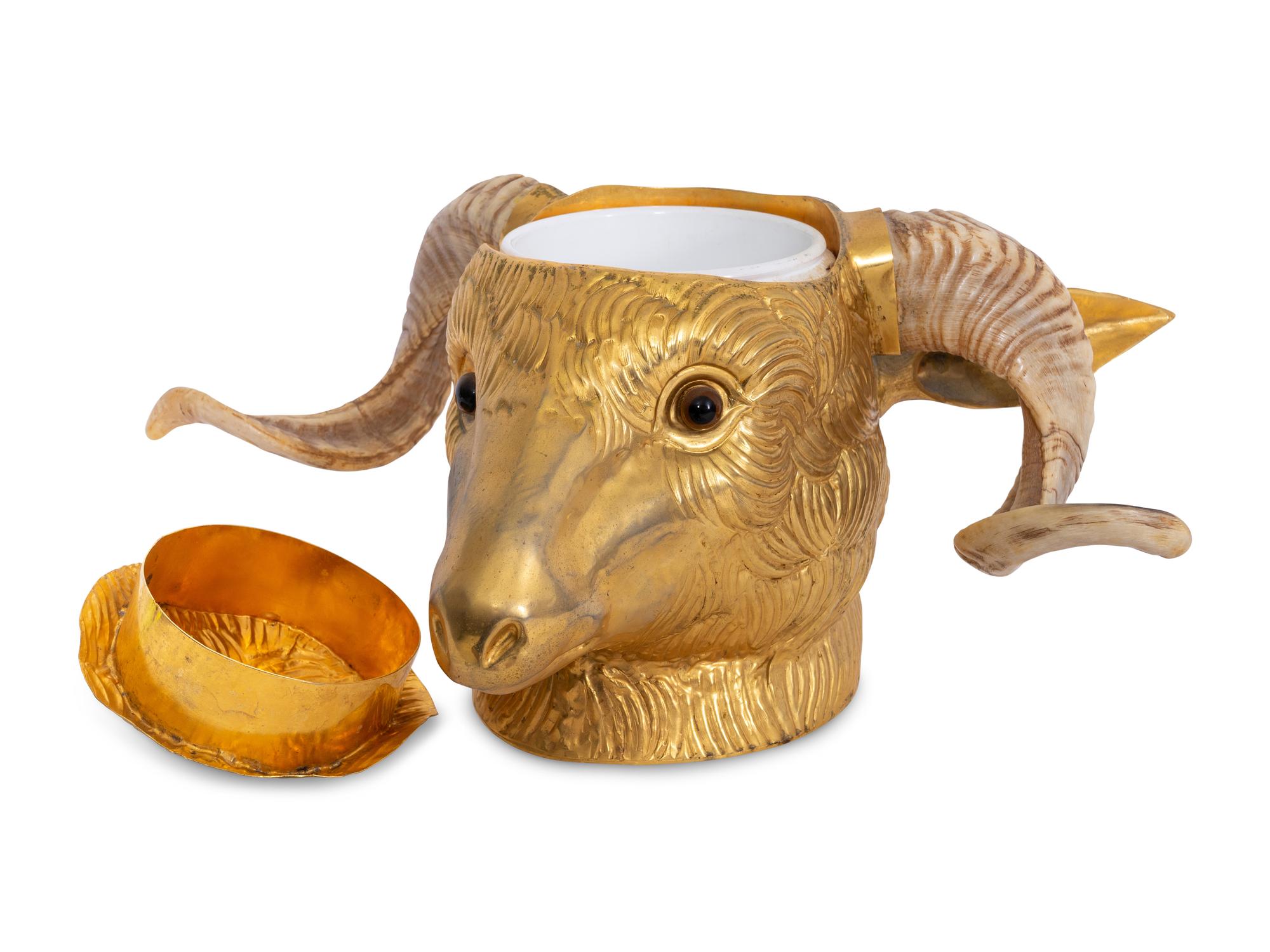 A Gilt Metal and Horn Ice Bucket in the Form of a Ram's Head