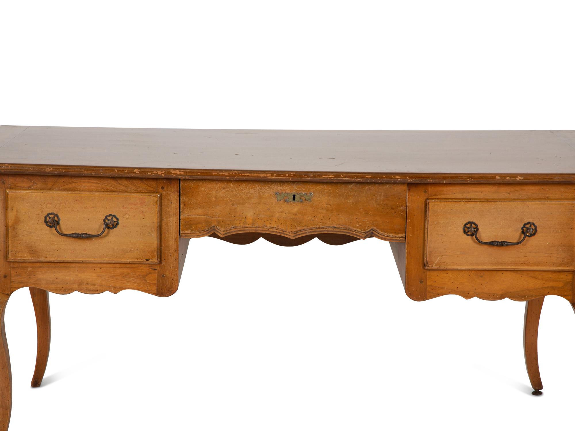 A Louis XV Provincial Style Fruitwood Writing Table
