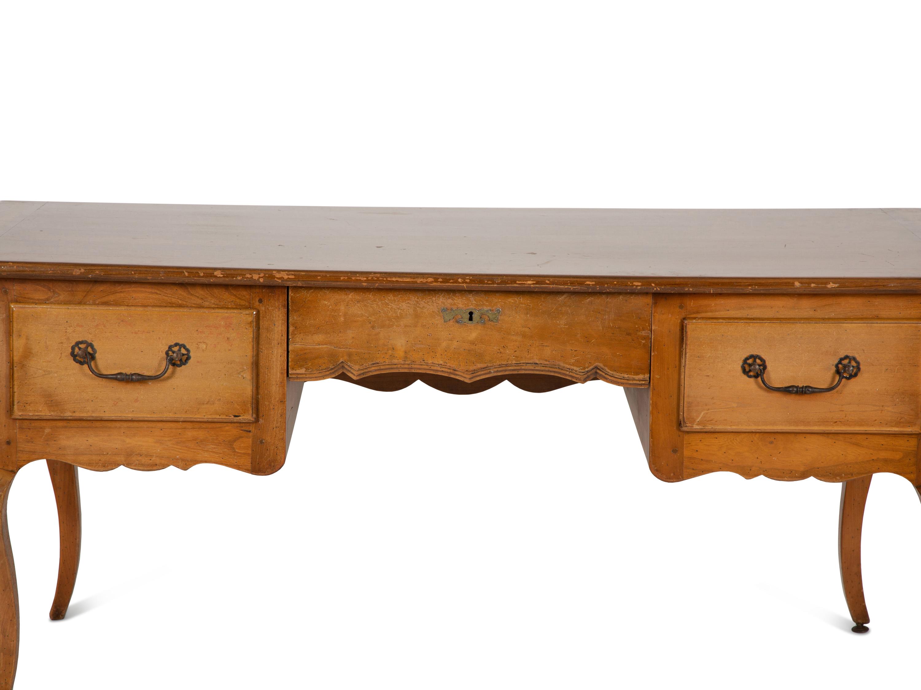 A Louis XV Provincial Style Fruitwood Writing Table
