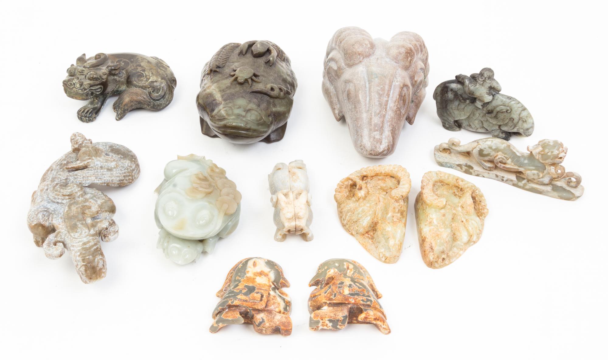 A Group of Ten Archaic Jade Toggles. Length of longest 6 1/2 inches.