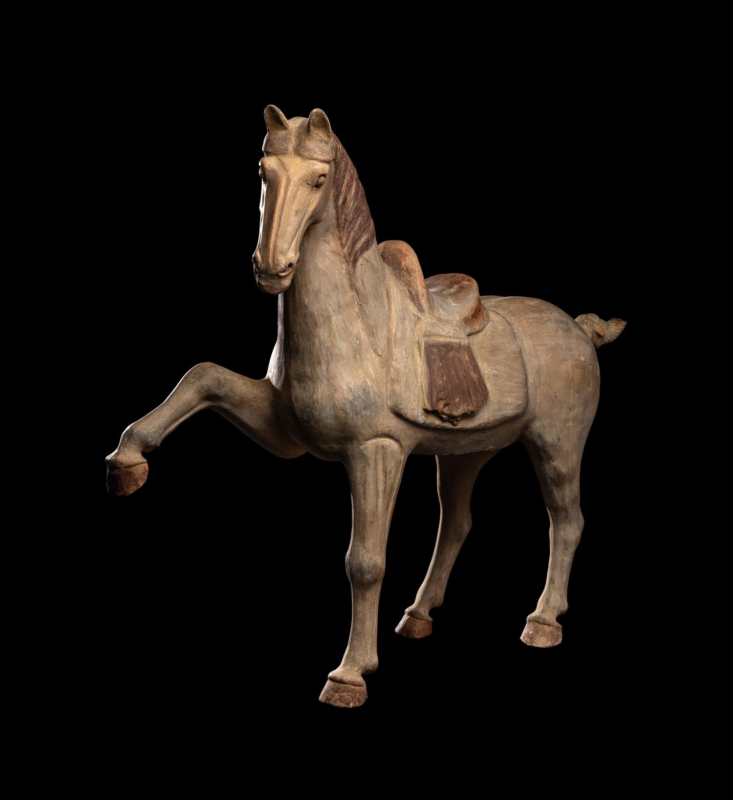 A Chinese Painted Pottery Figure of a Horse