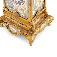 A French "Japonisme" Gilt Bronze and Porcelain Mounted Clock
