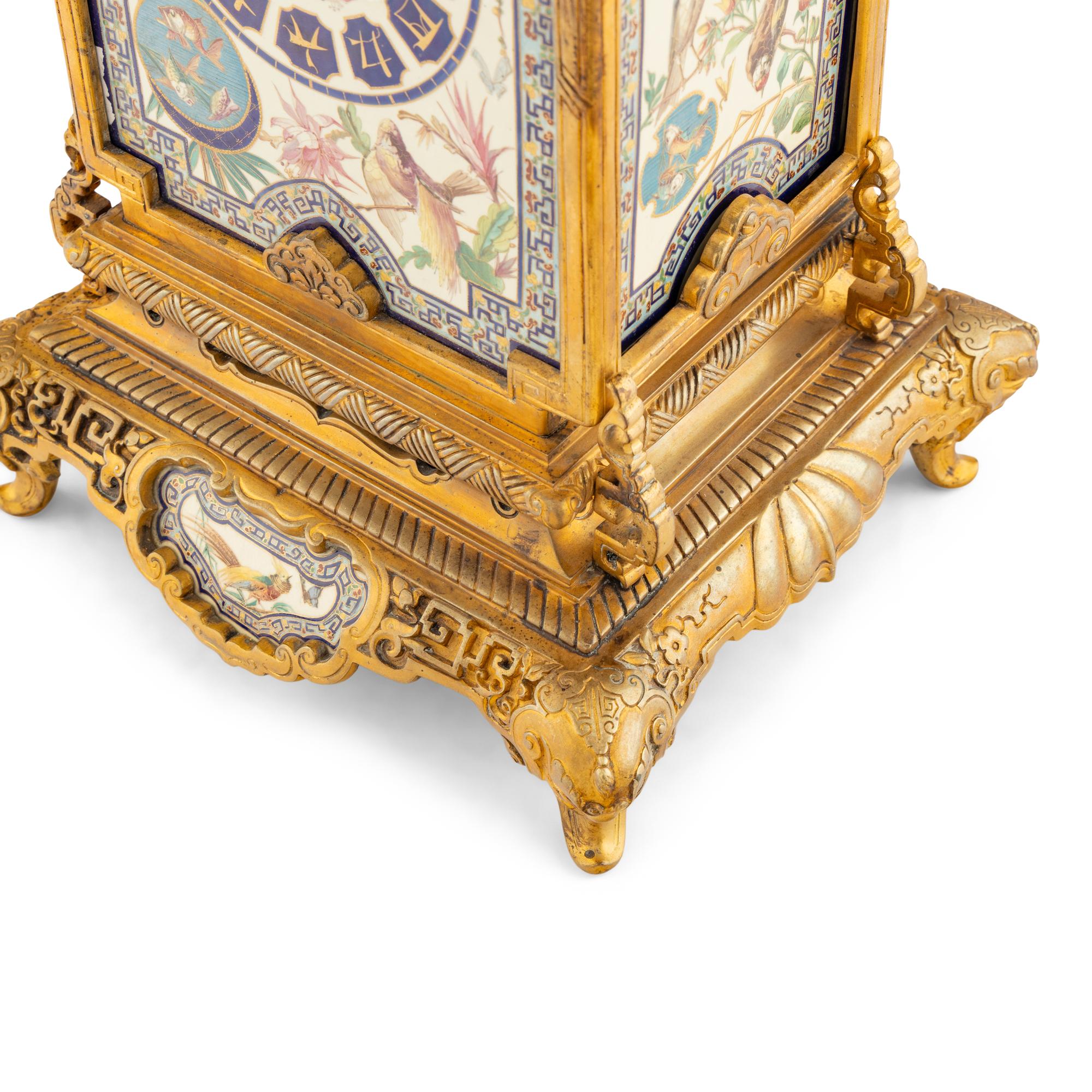 A French "Japonisme" Gilt Bronze and Porcelain Mounted Clock