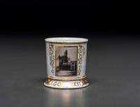 A Photographic Transfer Porcelain Shaving Mug Depicting the Arion Theatre, New York