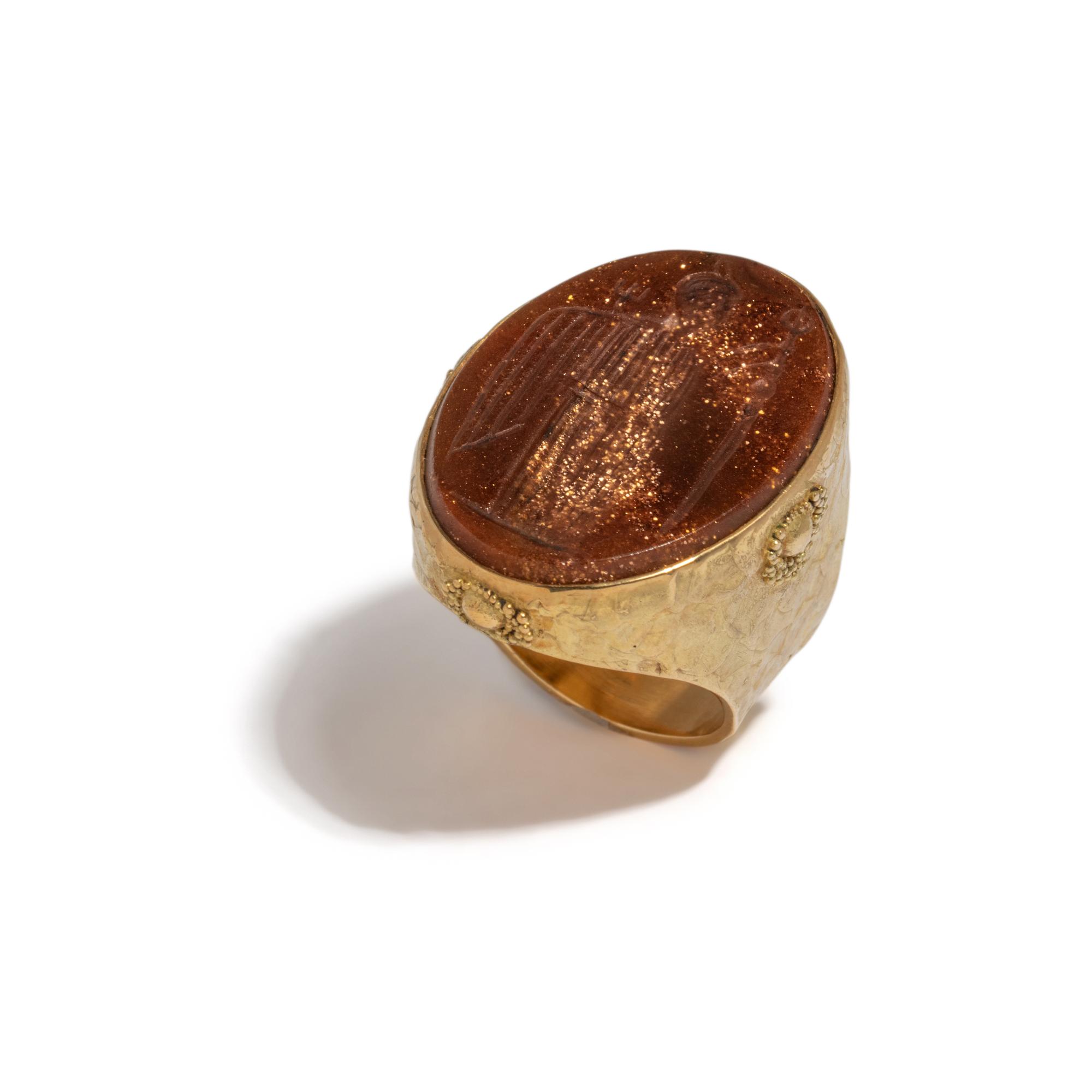 ED WIENER, YELLOW GOLD AND SUNSTONE INTAGLIO RING