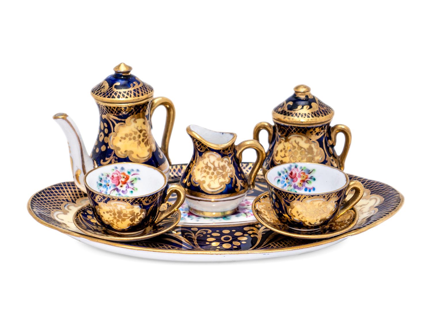 A Miniature Royal Staffordshire Porcelain Seven-Piece Coffee Service