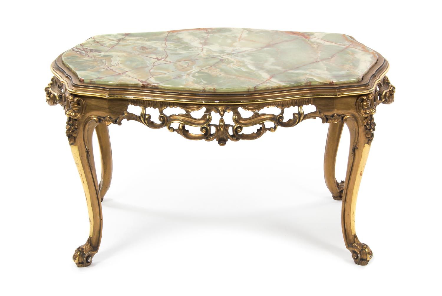 A Continental Giltwood and Onyx Low Table, Height 20 1/2 x width 35 1/2 x depth 22 1/2 inches.