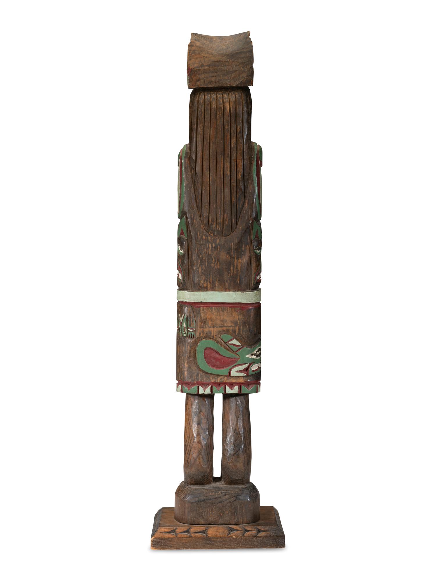 A Carved Totemic Figure, In the Northwest Coast Style