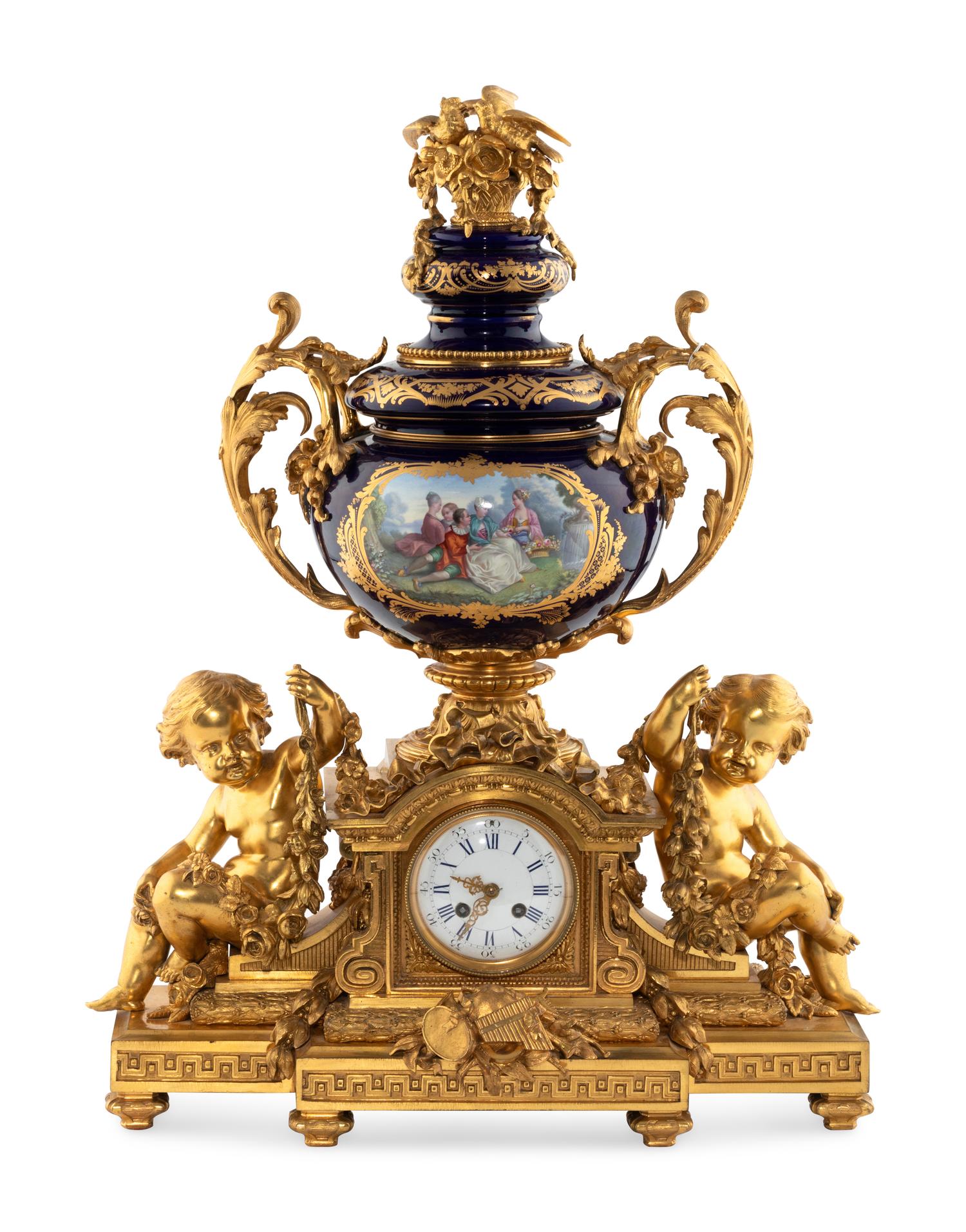 A French Gilt Bronze and Sèvres Style Porcelain Clock