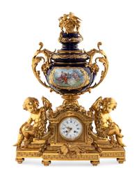 A French Gilt Bronze and Sèvres Style Porcelain Clock