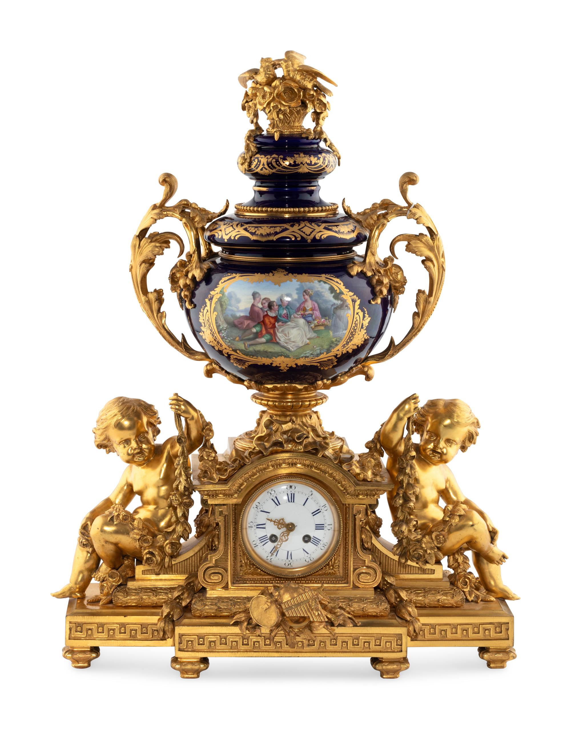 A French Gilt Bronze and Sèvres Style Porcelain Clock