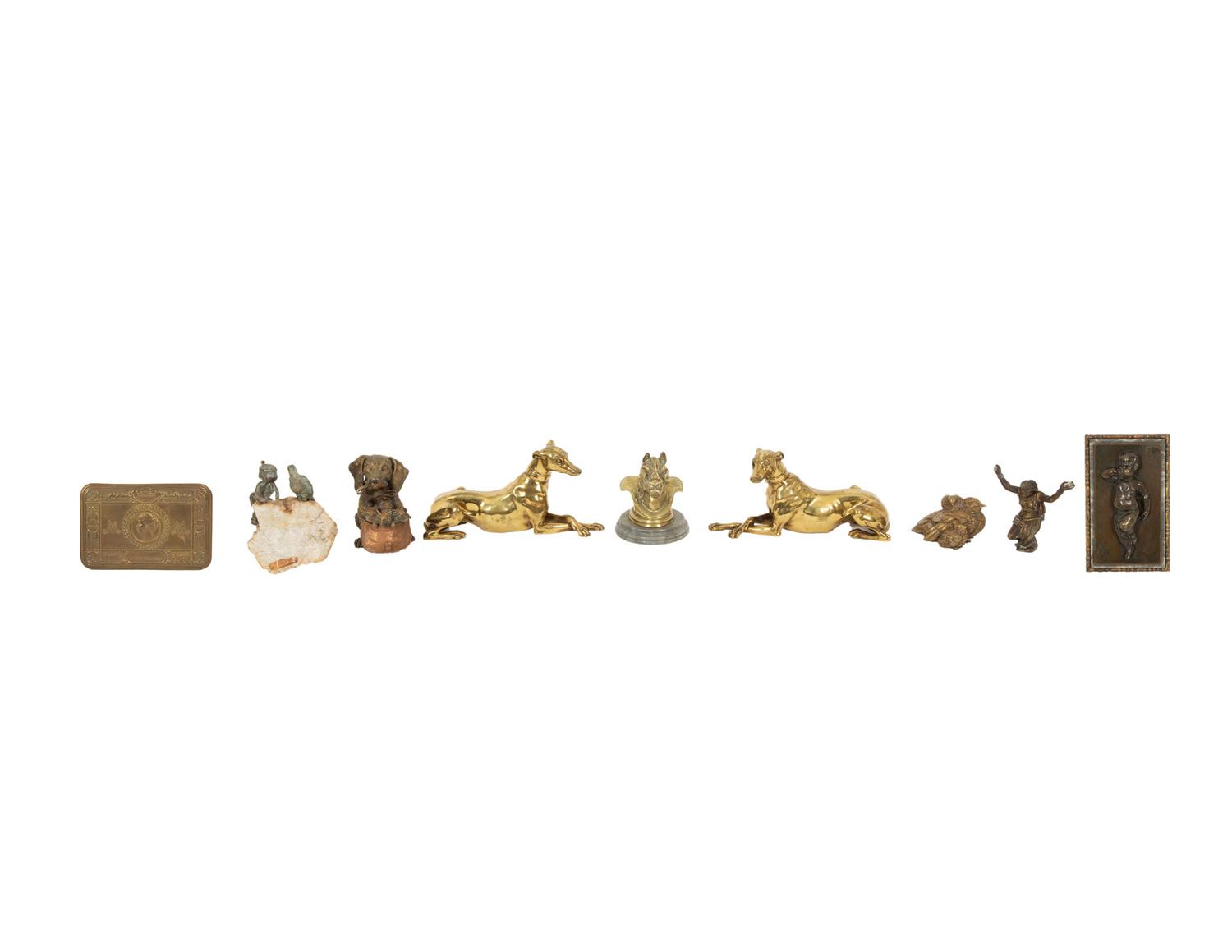 A Group of Brass and Patinated Metal Desk Accessories