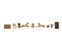 A Group of Brass and Patinated Metal Desk Accessories