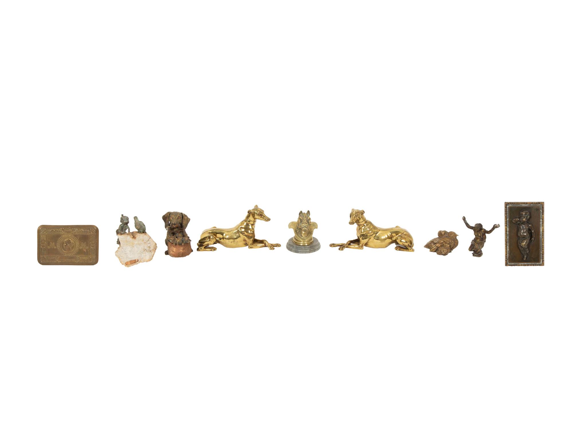 A Group of Brass and Patinated Metal Desk Accessories
