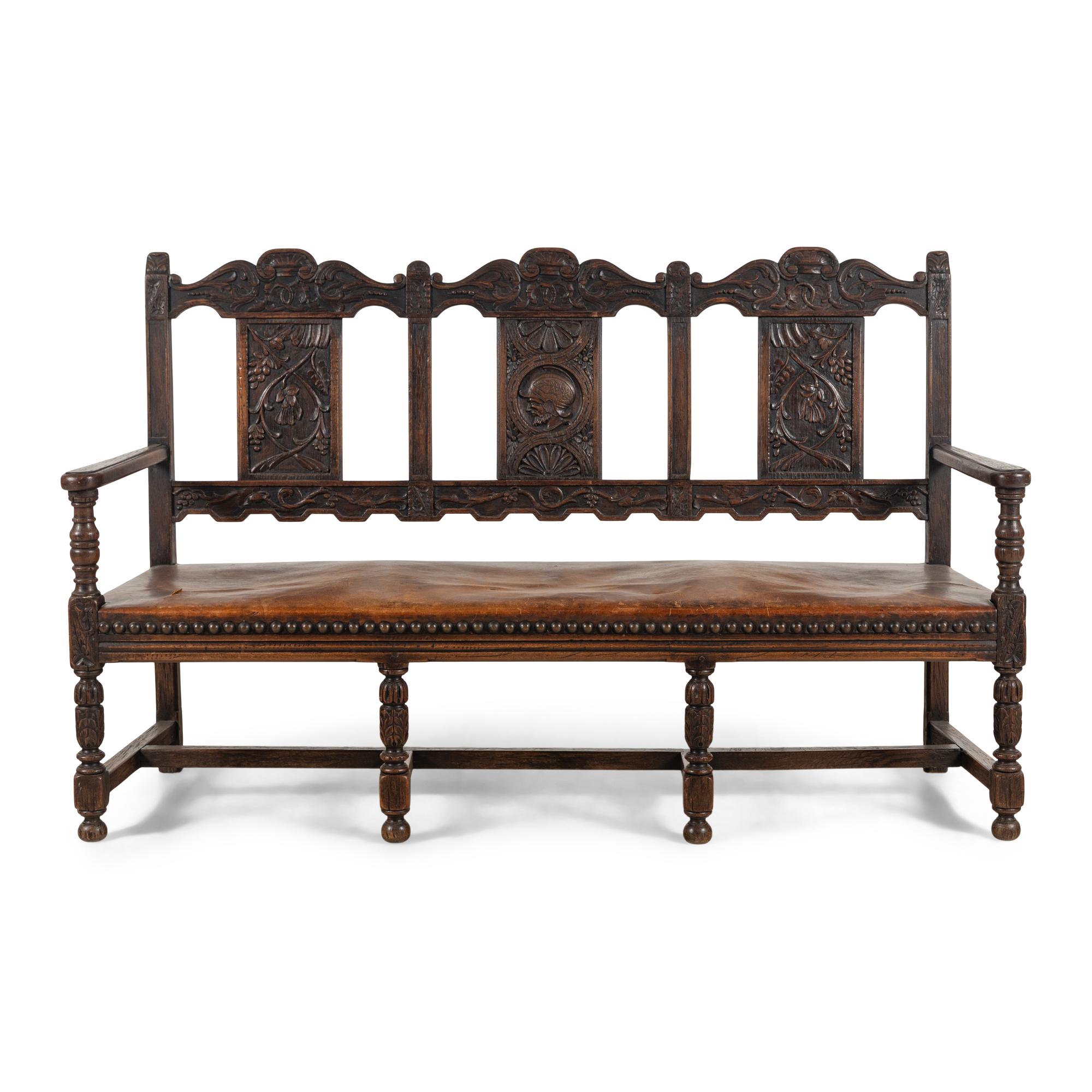 A Continental Carved Oak Hall Bench