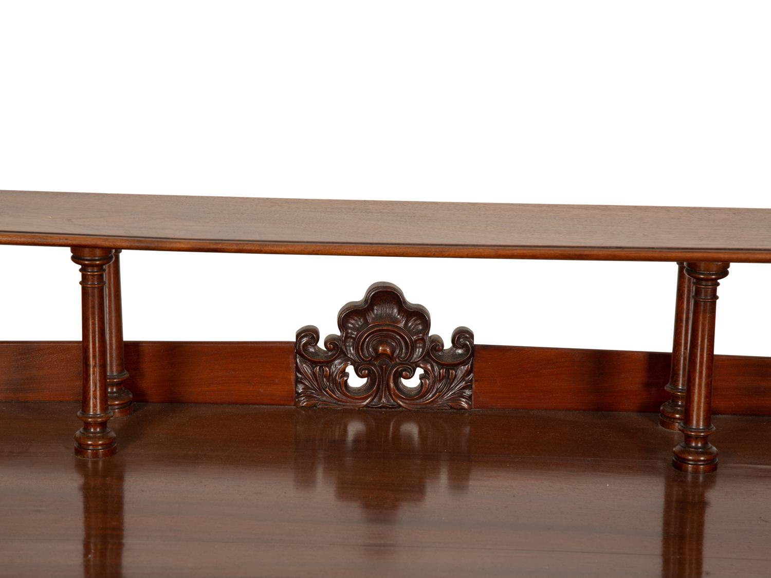 A Victorian Mahogany Lady's Writing Table with Shelf