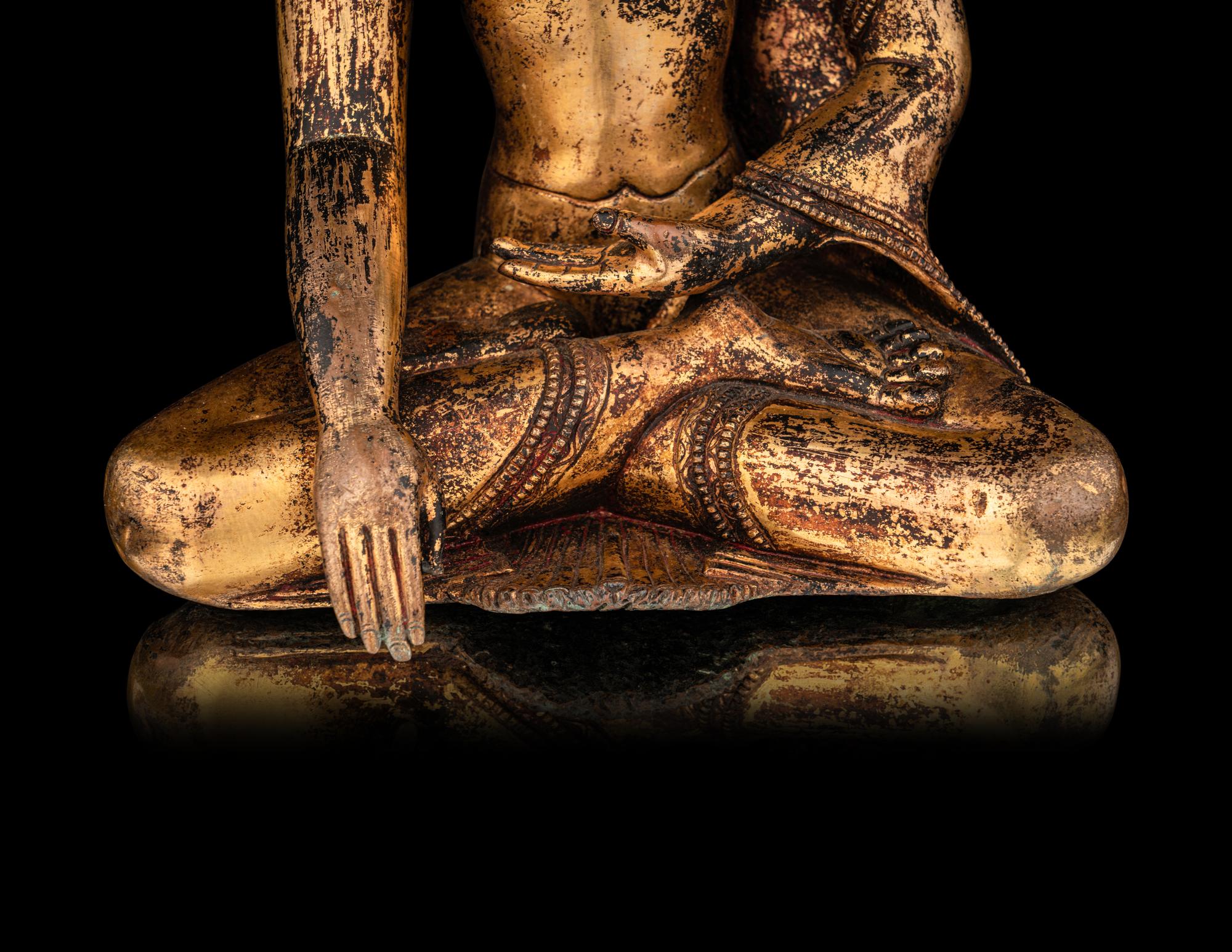 A Large Gilt Bronze Figure of a Buddha