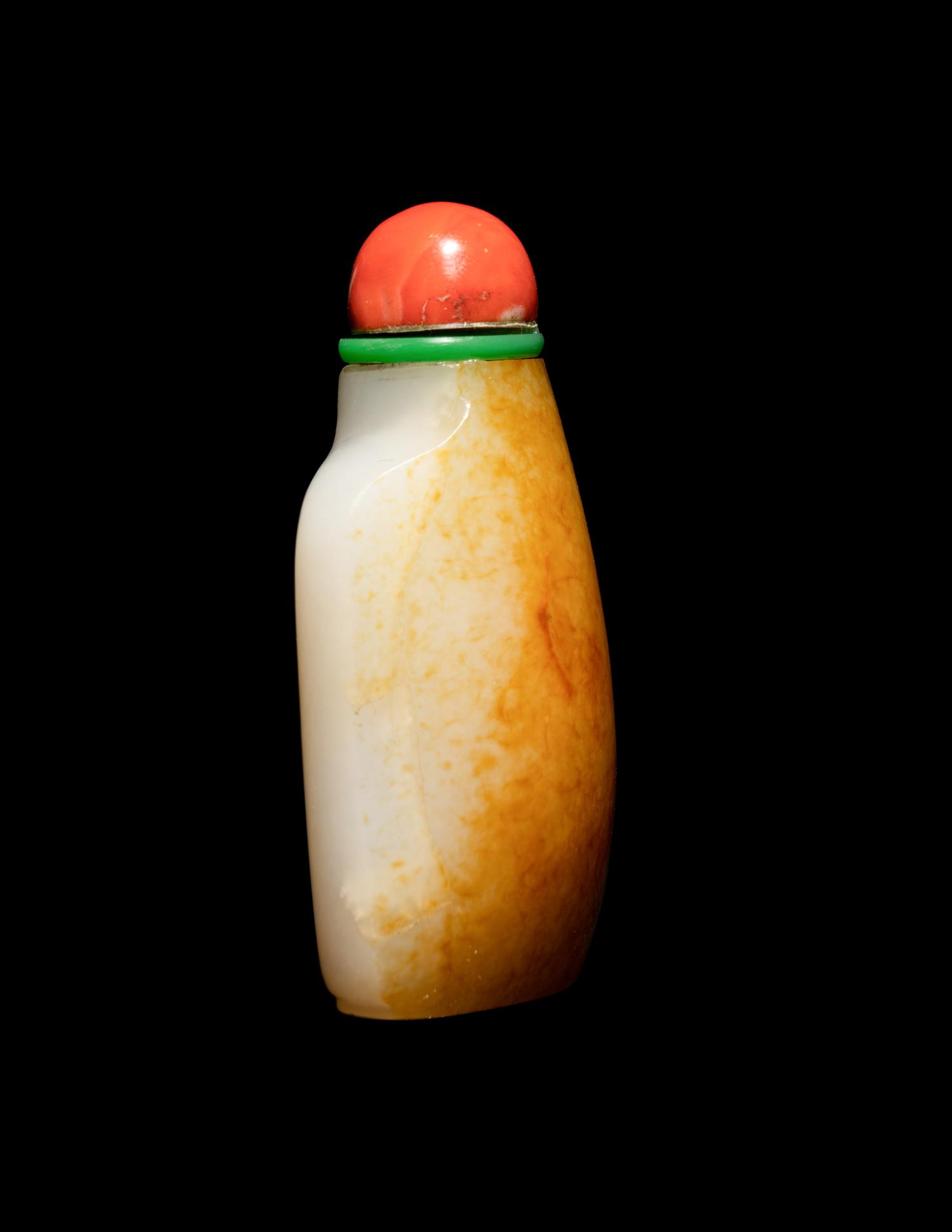 A Chinese Russet and White Jade Snuff Bottle