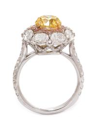 An 18 Karat Tricolor Gold, Fancy Vivid Yellow Diamond, Diamond and Colored Diamond Ring, 4.90 dwts.
