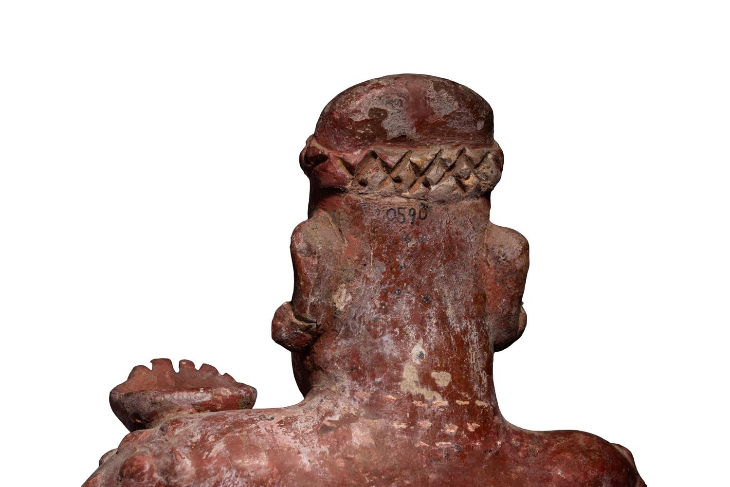 A Colima Seated Figure