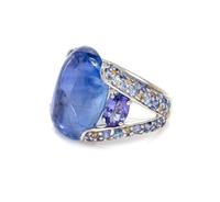 An 18 Karat White Gold, Sapphire, Tanzanite and Diamond Ring, 8.30 dwts.