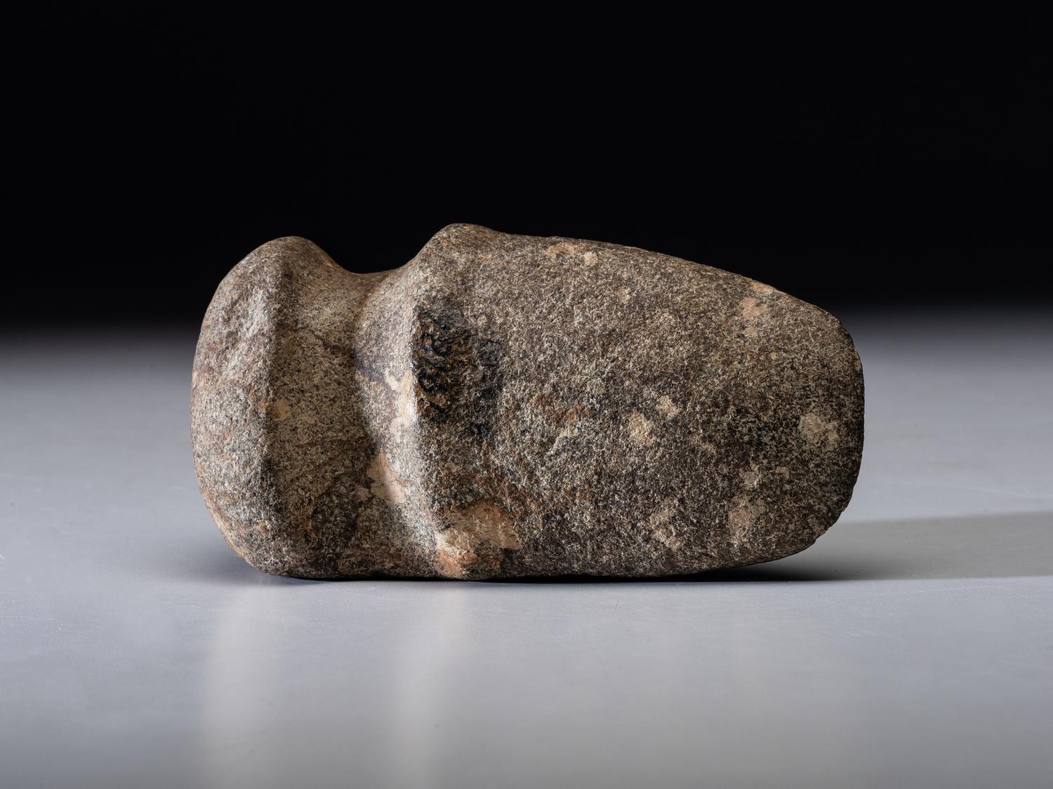 A Porphyry 3/4 Groove Axe